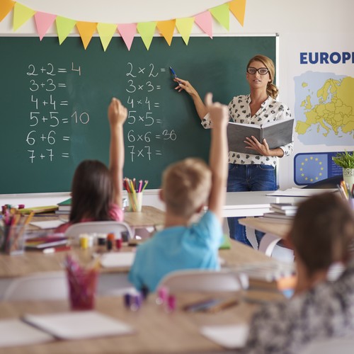 Many Hands Of Volunteers During Maths Class